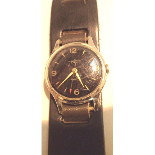 1073 - Ingersoll vintage black face wristwatch. Working at lotting. P&P Group 1 (£14+VAT for the first lot ... 