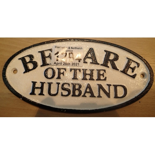 1294 - Cast iron Beware of The Husband sign, L: 17 cm. P&P Group 1 (£14+VAT for the first lot and £1+VAT fo... 