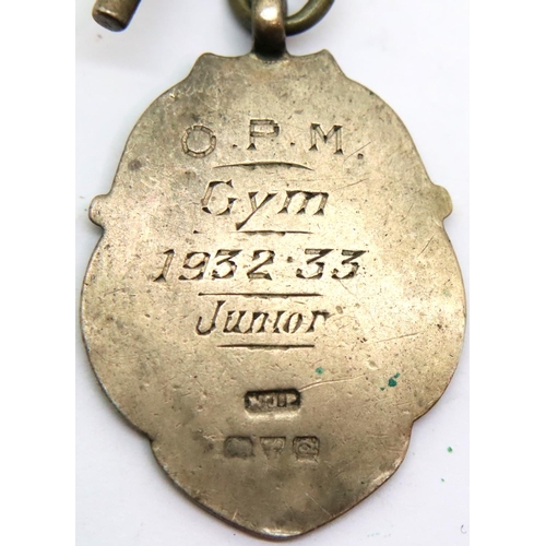 118 - Hallmarked silver single Albert pocket watch chain with a silver fob, 29g Chester assay, with an ant... 