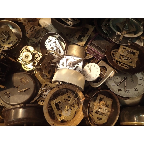 1409 - Box of assorted clock movements. Not available for in-house P&P, contact Paul O'Hea at Mailboxes on ... 