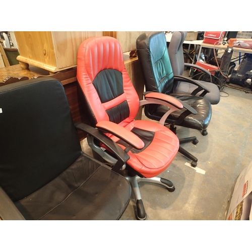 1434 - Three leather effect high back swivel and wheeled office chairs with two others. Not available for i... 