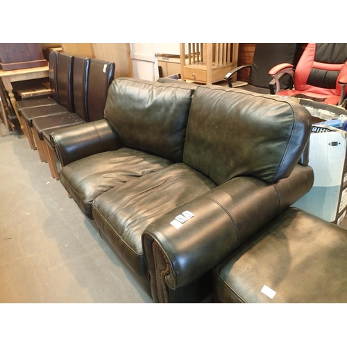 1444 - Two seater green leather settee with matching footstool. Not available for in-house P&P, contact Pau... 