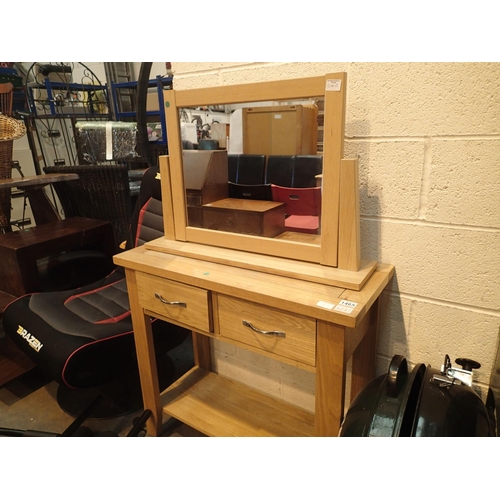 1465 - Modern pine two drawer side table and a modern pine framed dressing table mirror, non matching. Not ... 