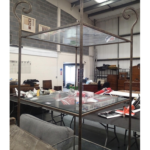 1502 - A large modern wrought iron display stand with four glass shelves, 69 x 69 x 213H cm. Not available ... 