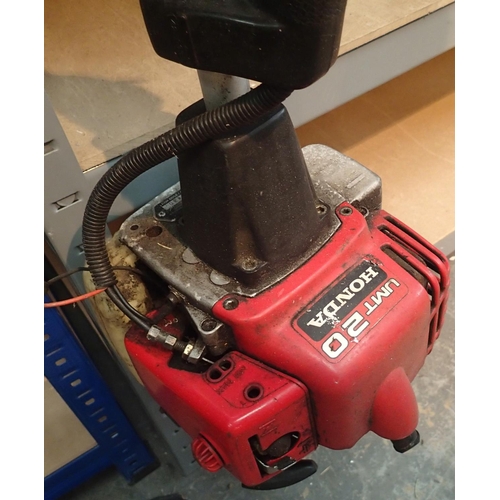 1536 - Honda UM20 petrol garden strimmer. Not available for in-house P&P, contact Paul O'Hea at Mailboxes o... 