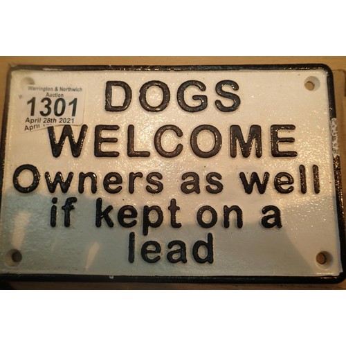 1301 - Cast iron Dogs Welcome sign, L: 20 cm. P&P Group 1 (£14+VAT for the first lot and £1+VAT for subsequ... 