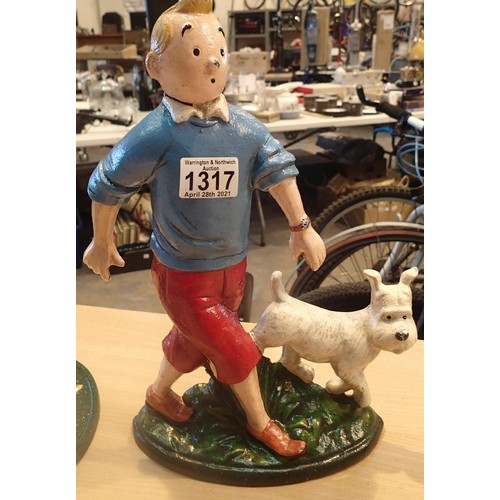 1317 - Cast iron TinTin and Snowy doorstop, H: 33 cm. P&P Group 2 (£18+VAT for the first lot and £3+VAT for... 