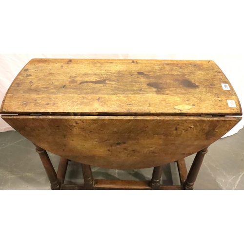 419 - A late 18th Century oak farmhouse dropleaf table of small proportions raised on gate supports, 88 x ... 