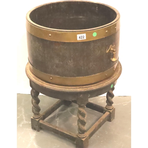 422 - Quarter size brass bound twin handled barrel planter upon an oak barleytwist base. Not available for... 