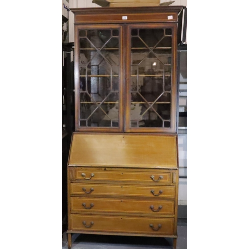 436 - An Edwardian inlaid mahogany bureau bookcase, having two astragal glazed doors above the fitted fall... 