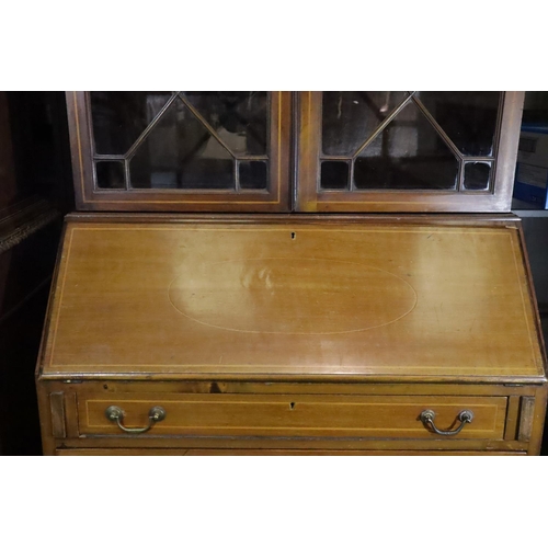 436 - An Edwardian inlaid mahogany bureau bookcase, having two astragal glazed doors above the fitted fall... 