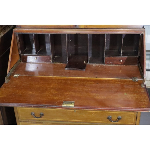 436 - An Edwardian inlaid mahogany bureau bookcase, having two astragal glazed doors above the fitted fall... 