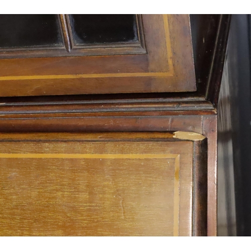 436 - An Edwardian inlaid mahogany bureau bookcase, having two astragal glazed doors above the fitted fall... 