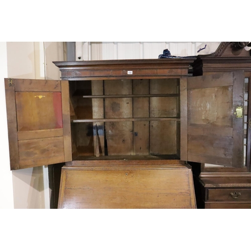 438 - George III Provincial oak bureau bookcase, the two door cupboard above fitted fall front desk and fo... 