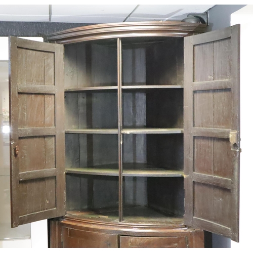 439 - Substantial 18th Century English oak four door corner cupboard fitted with shelves, W: 110 cm, H: 20... 