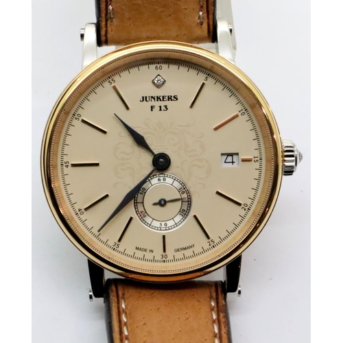 64 - Gents new old stock Junkers boxed fashion wristwatch. P&P Group 1 (£14+VAT for the first lot and £1+... 