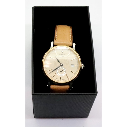 64 - Gents new old stock Junkers boxed fashion wristwatch. P&P Group 1 (£14+VAT for the first lot and £1+... 