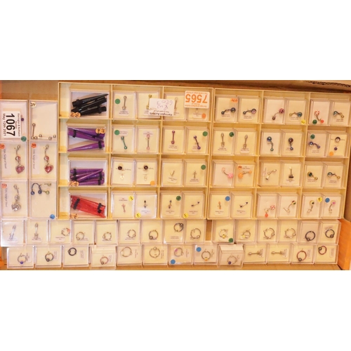 1067 - Tray of assorted body jewellery. Not available for in-house P&P, contact Paul O'Hea at Mailboxes on ... 