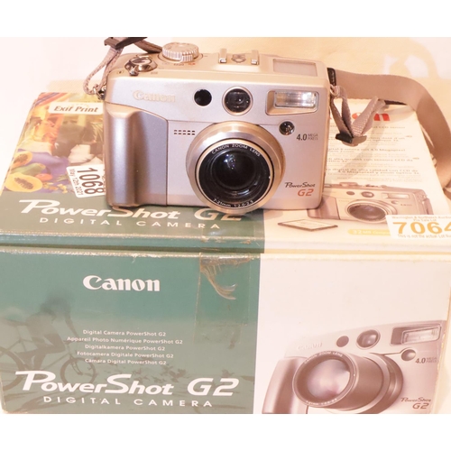 1068 - Boxed Canon Powershot G2 digital camera. P&P Group 1 (£14+VAT for the first lot and £1+VAT for subse... 