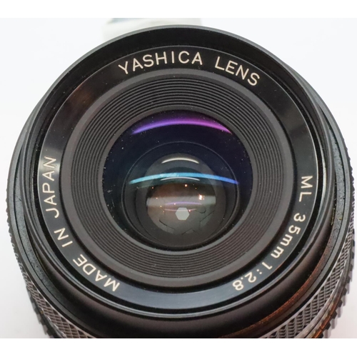 1087 - Yashica lens ML 35mm 1:28. P&P Group 1 (£14+VAT for the first lot and £1+VAT for subsequent lots)