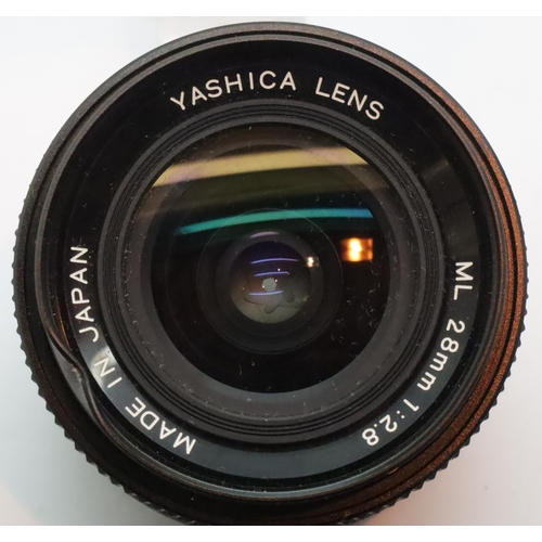 1090 - Yashica lens ML 28mm 1:28. P&P Group 1 (£14+VAT for the first lot and £1+VAT for subsequent lots)