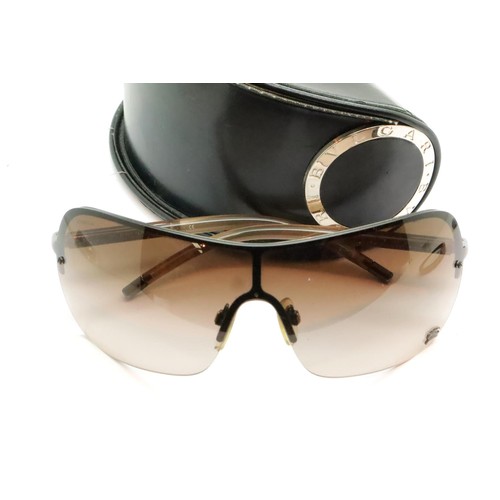 59 - Pair of gents Burberry sunglasses in a leather Bulgari case. P&P Group 1 (£14+VAT for the first lot ... 