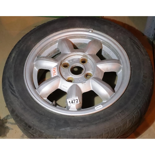 1472 - Mazda MX5 Mk1 14” alloy wheel with tyre.  Not available for in house P&P, contact Paul O’Hea at Mail... 