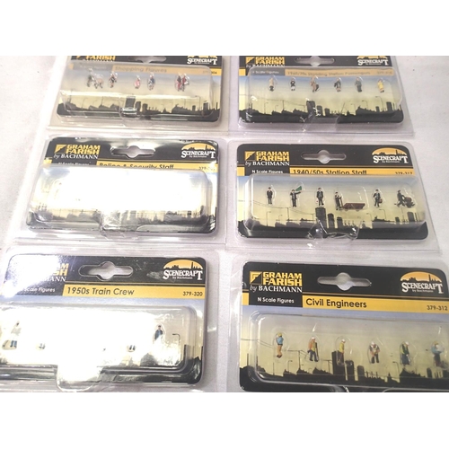 2298 - Six Bachmann/Farish N gauge figure sets, train crew, Police, civil engineers, station staff, passeng... 