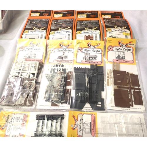 2305 - Ten N gauge Kestrel plastic kits; Church, water tower, houses, cottage, shops etc, all in packets. P... 