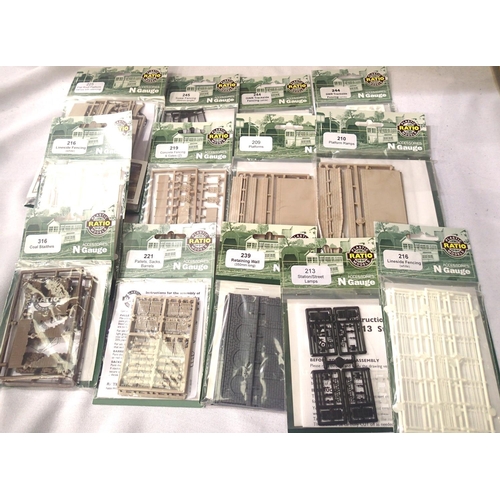 2307 - Twelve N gauge ratio trackside plastic kits; fencing, canopy, platforms, all in packets. P&P Group 1... 