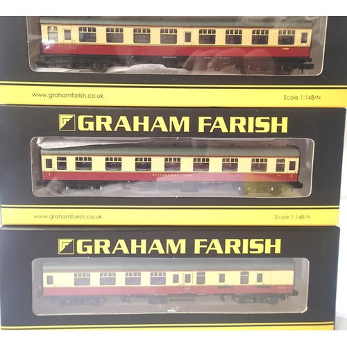 2319 - Three N gauge Farish blood/custard coaches, 374-807 restaurant/first, 374-185 brake/second and 374-0... 