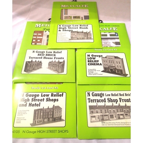 2290 - Five N gauge Metcalfe building kits, all low relief; houses, shops, cinema etc, sealed in packets. P... 