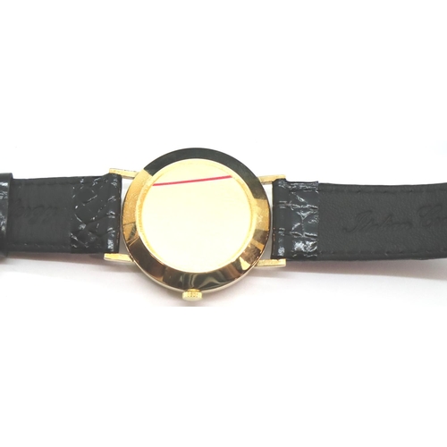 100 - Avia vintage mechanical 9ct gold wristwatch on black leather strap, working at lotting with original... 