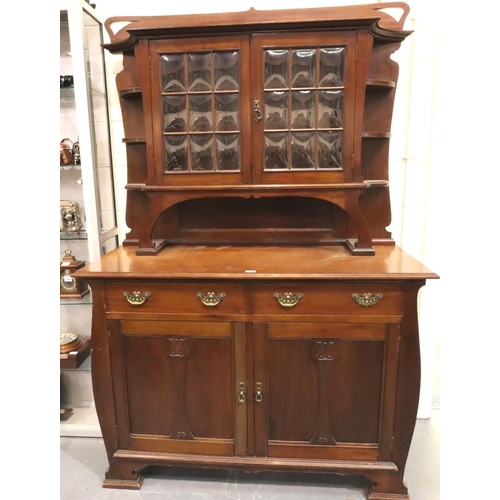 559 - A 19th century Art Nouveau mahogany dresser comprising a base of cupboard and drawers, top section s... 