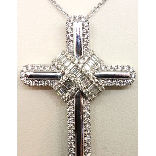 72 - 18ct gold diamond cross pendant with 0.96ct of diamonds on a 18ct white gold chain. P&P Group 1 (£14... 