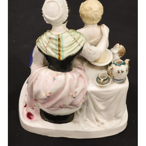 245 - Continental woman and boy figurine, H: 21 cm. P&P Group 2 (£18+VAT for the first lot and £3+VAT for ... 