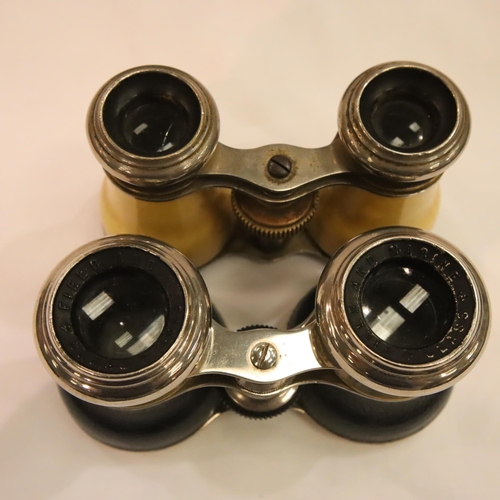 384 - Cased set of Field and Marine binoculars with a further set of vintage binoculars. P&P Group 2 (£18+... 