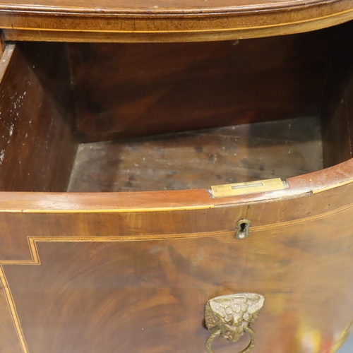 541 - Regency mahogany bow fronted buffet, with two long drawers flanked by two cupboard doors, satinwood ... 