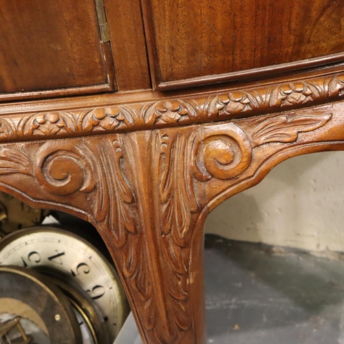 542 - A 20th century walnut four door sideboard in the Epstein style, raised on claw and ball supports, 13... 