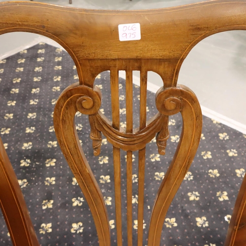 544 - A 20th century walnut dining table with two drop in leaves and six chairs (4+2), 224 x 115 x 75 cm H... 