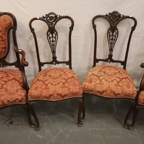 553 - Victorian walnut framed salon suite comprising a two-seat settee, two elbow chairs and two further c... 