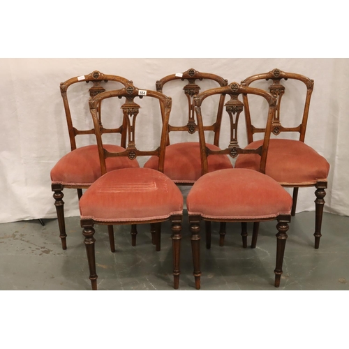 554 - Five Victorian walnut framed upholstered dining chairs on turned and tapered supports. Not available... 