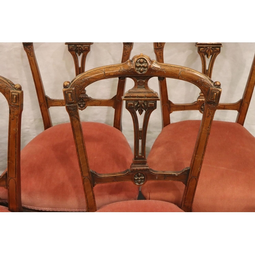 554 - Five Victorian walnut framed upholstered dining chairs on turned and tapered supports. Not available... 