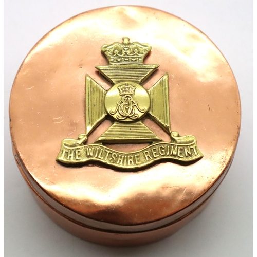 3109 - Trench Art; a WWI Wiltshire Regiment badge on a heavy copper pot, D: 70 mm . P&P Group 1 (£14+VAT fo... 