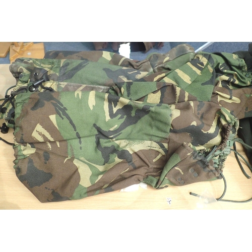 3075 - Four pairs of British Army Gortex, used grade 1 condition. P&P Group 2 (£18+VAT for the first lot an... 