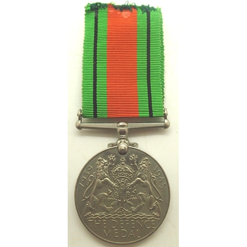 3203 - WWII British Defense medal with a RNPS shield, awarded to those who volunteered their services and v... 