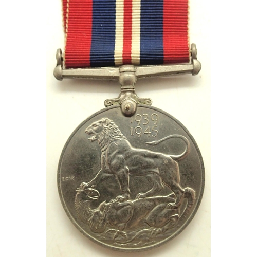 3209 - British WWII Defense medal. P&P Group 1 (£14+VAT for the first lot and £1+VAT for subsequent lots)