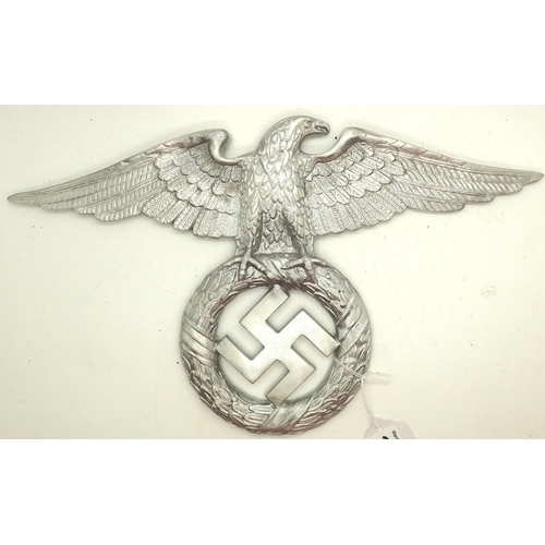 3114 - An early NSDAP copy cast and polished metal wall or door mounting eagle, wingspan: 35 cm. P&P Group ... 