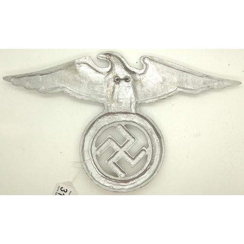 3114 - An early NSDAP copy cast and polished metal wall or door mounting eagle, wingspan: 35 cm. P&P Group ... 