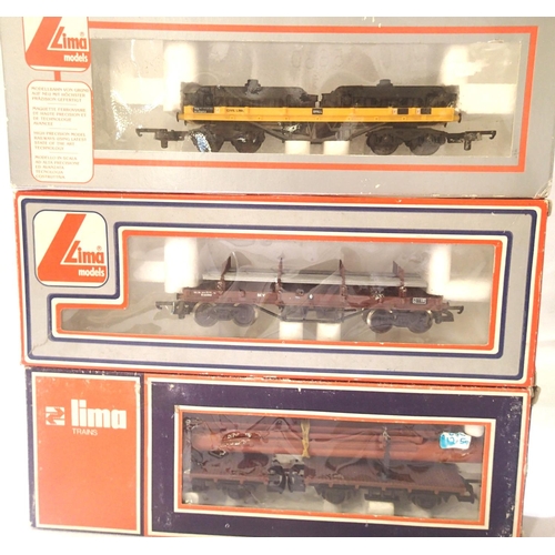 2349 - Three Lima bogie carrier wagons, all with different loads. P&P Group 1 (£14+VAT for the first lot an... 